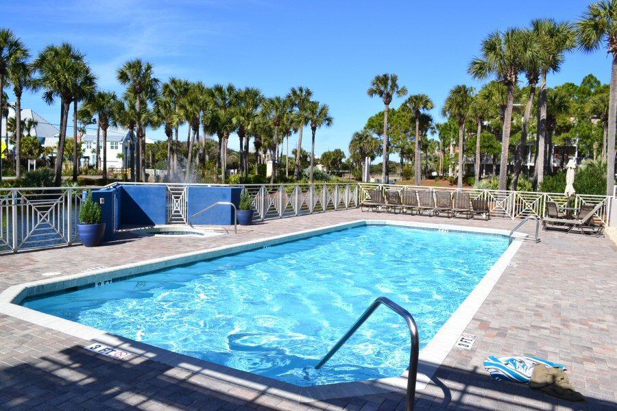 1740 South County Highway, Unit 110 Santa Rosa Beach, FL 32459 - Photo 9 of 22 a view of a swimming pool with chairs