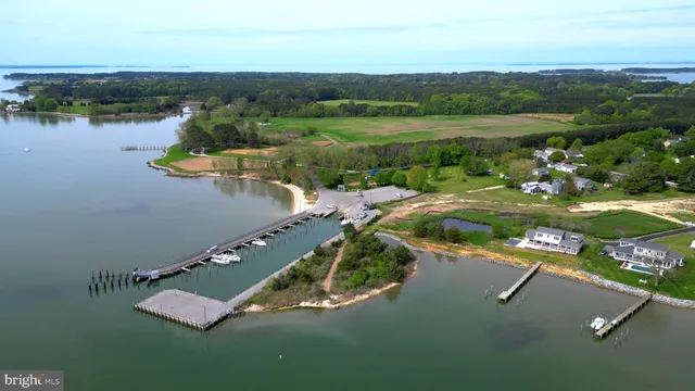 a view of a lake with houses in outdoor space