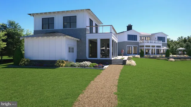 a view of a house with a yard porch and sitting area