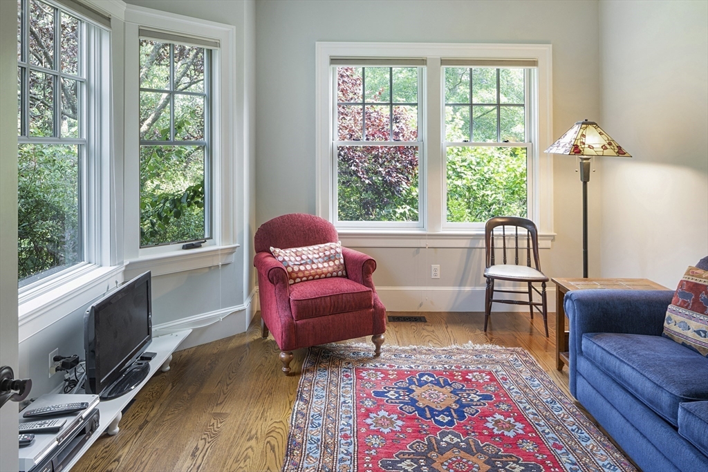 49 Willard Common Concord, MA 01742 - Photo 20 of 39 a living room with furniture and a window