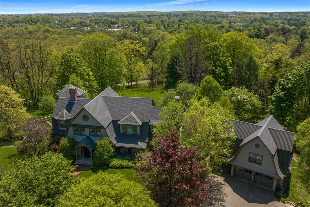 49 Willard Common Concord, MA 01742 - Photo 2 of 39 an aerial view of a house with yard and green space