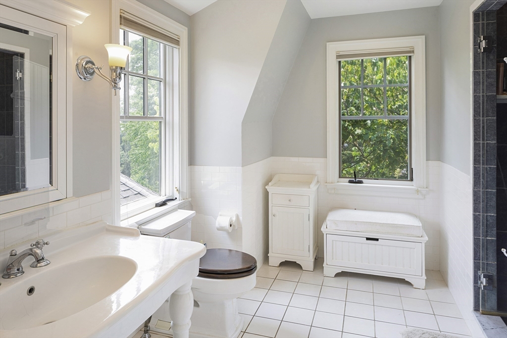 49 Willard Common Concord, MA 01742 - Photo 24 of 39 a bathroom with a sink toilet and tub