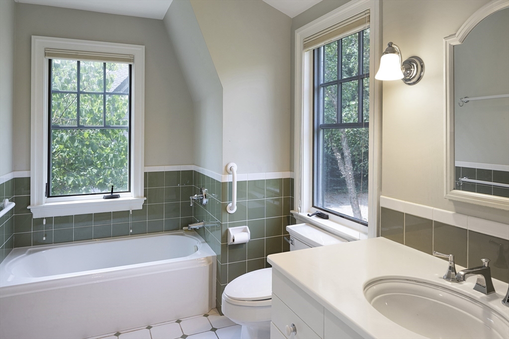 49 Willard Common Concord, MA 01742 - Photo 25 of 39 a bathroom with a sink toilet and shower