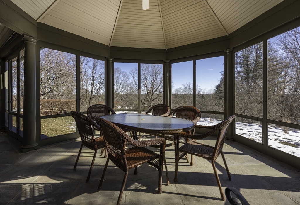 49 Willard Common Concord, MA 01742 - Photo 37 of 39 a view of a dining room with furniture and window