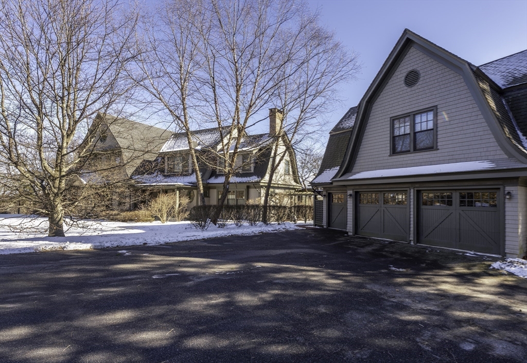 49 Willard Common Concord, MA 01742 - Photo 38 of 39 a front view of residential houses with yard and trees