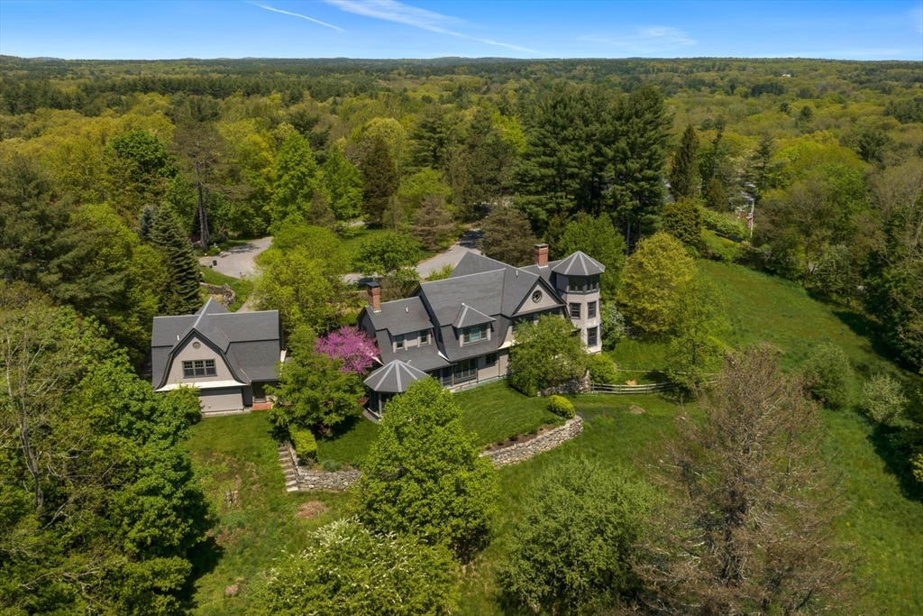 49 Willard Common Concord, MA 01742 - Photo 4 of 39 a view of a city with lush green forest