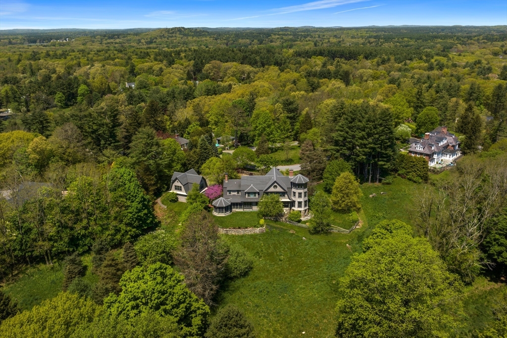 49 Willard Common Concord, MA 01742 - Photo 5 of 39 a view of a lake with lots of trees