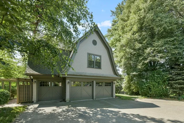 front view of a house with a garden