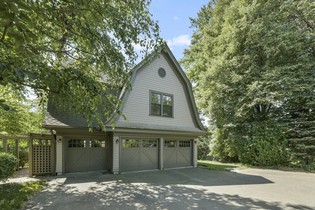49 Willard Common Concord, MA 01742 - Photo 7 of 39 front view of a house with a garden