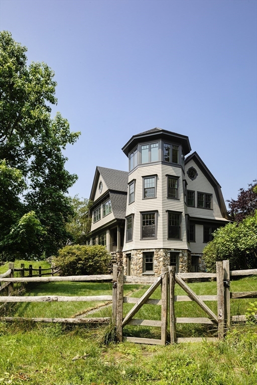 49 Willard Common Concord, MA 01742 - Photo 8 of 39 a front view of a house with a yard