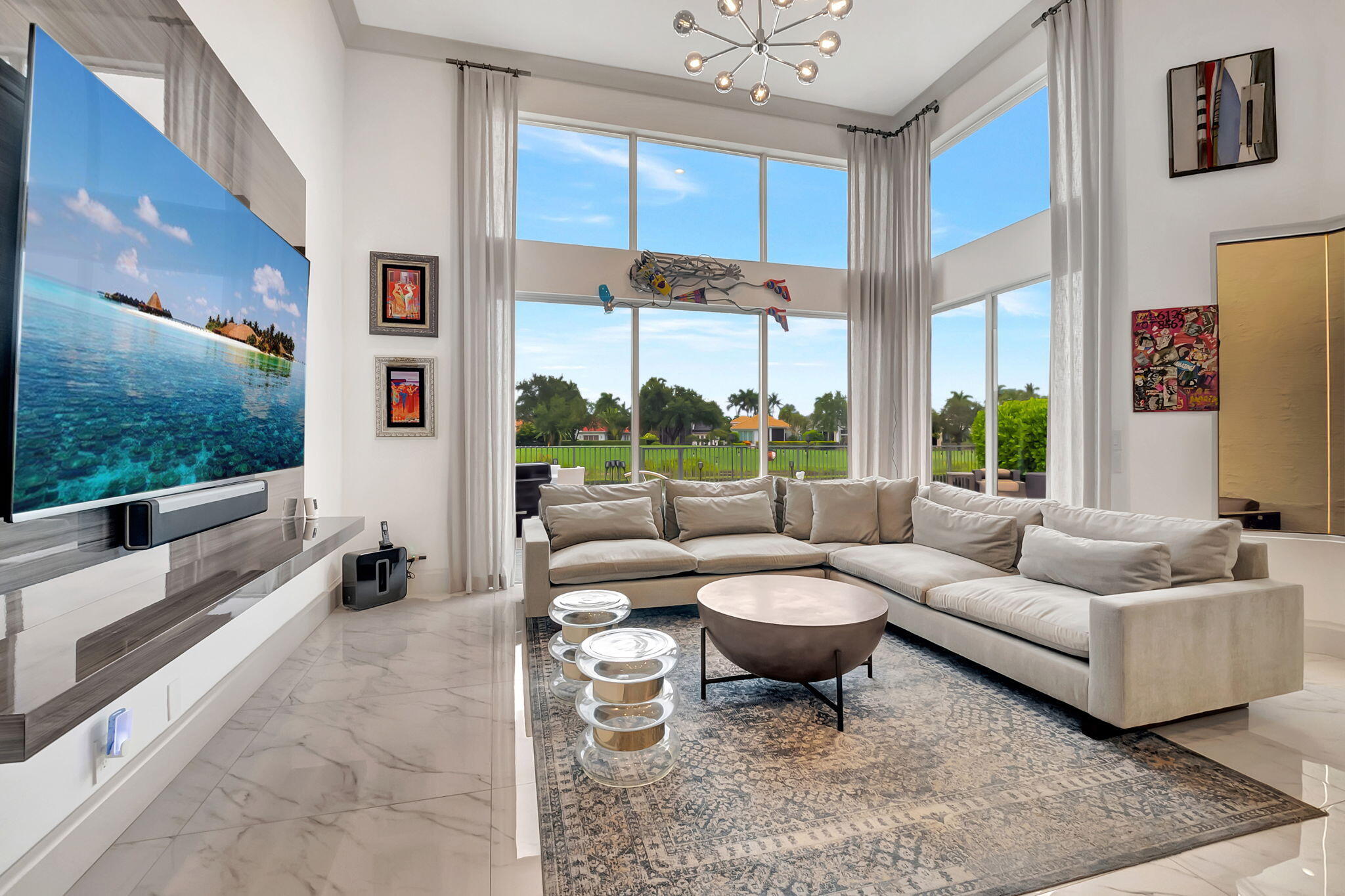 4137 Briarcliff Circle Boca Raton, FL 33496 - Photo 11 of 59 a living room with furniture and a large window