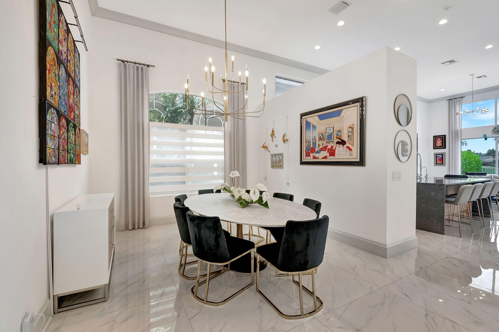 4137 Briarcliff Circle Boca Raton, FL 33496 - Photo 13 of 59 a view of a dining room with furniture window and wooden floor