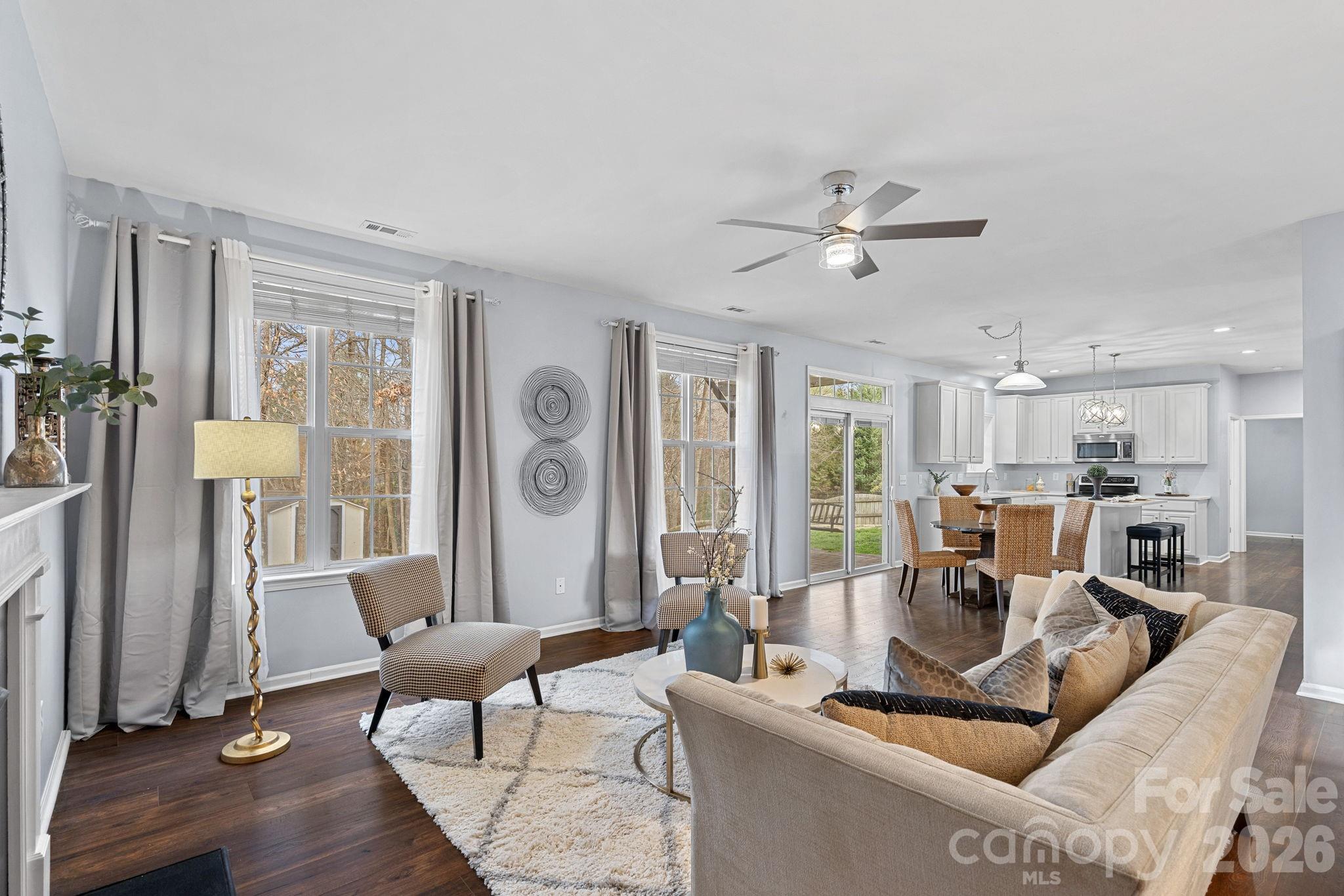 2017 East Foxwood Court Fort Mill, SC 29707 - Photo 13 of 33 a living room with furniture and a large window