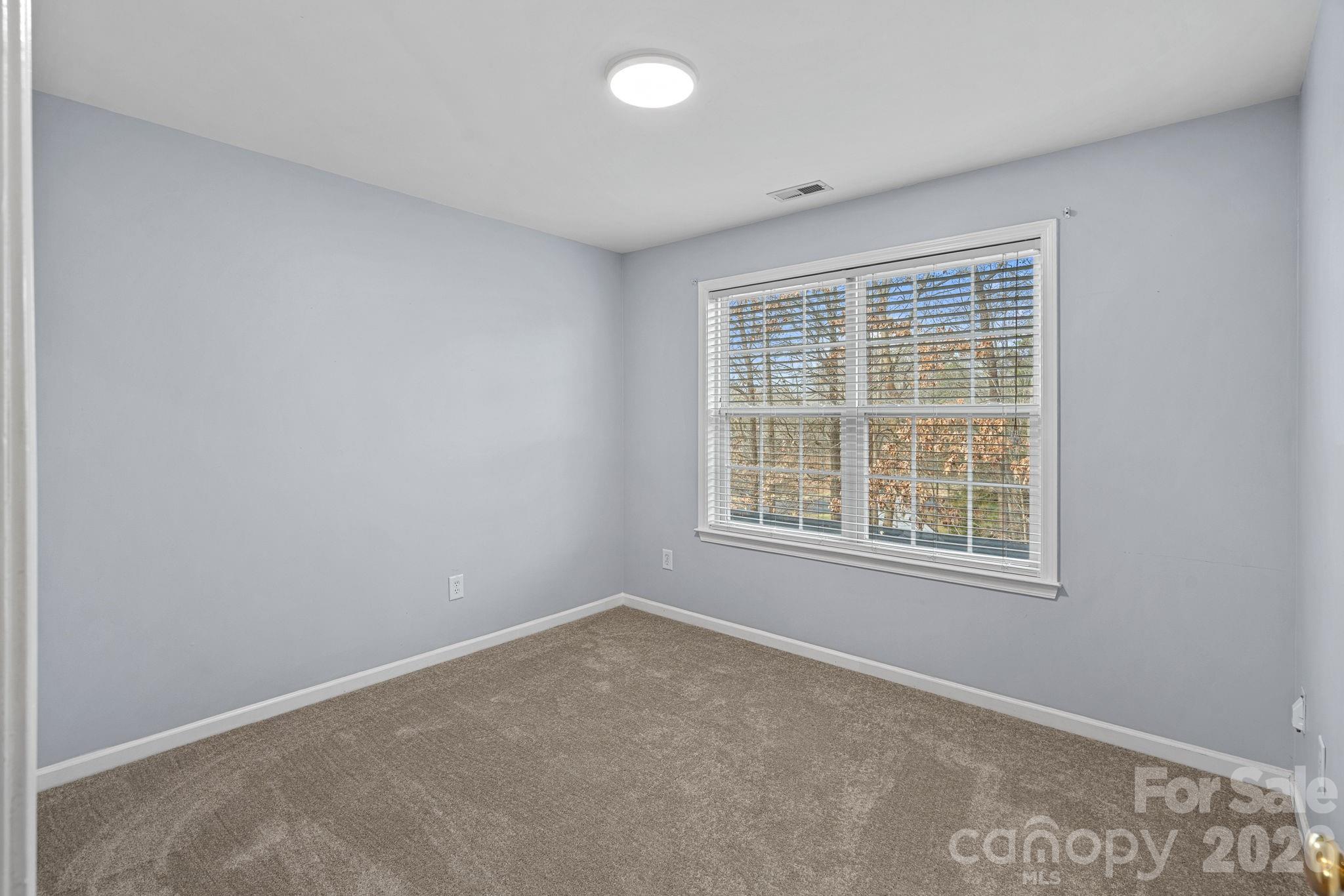 2017 East Foxwood Court Fort Mill, SC 29707 - Photo 20 of 33 an empty room with a window