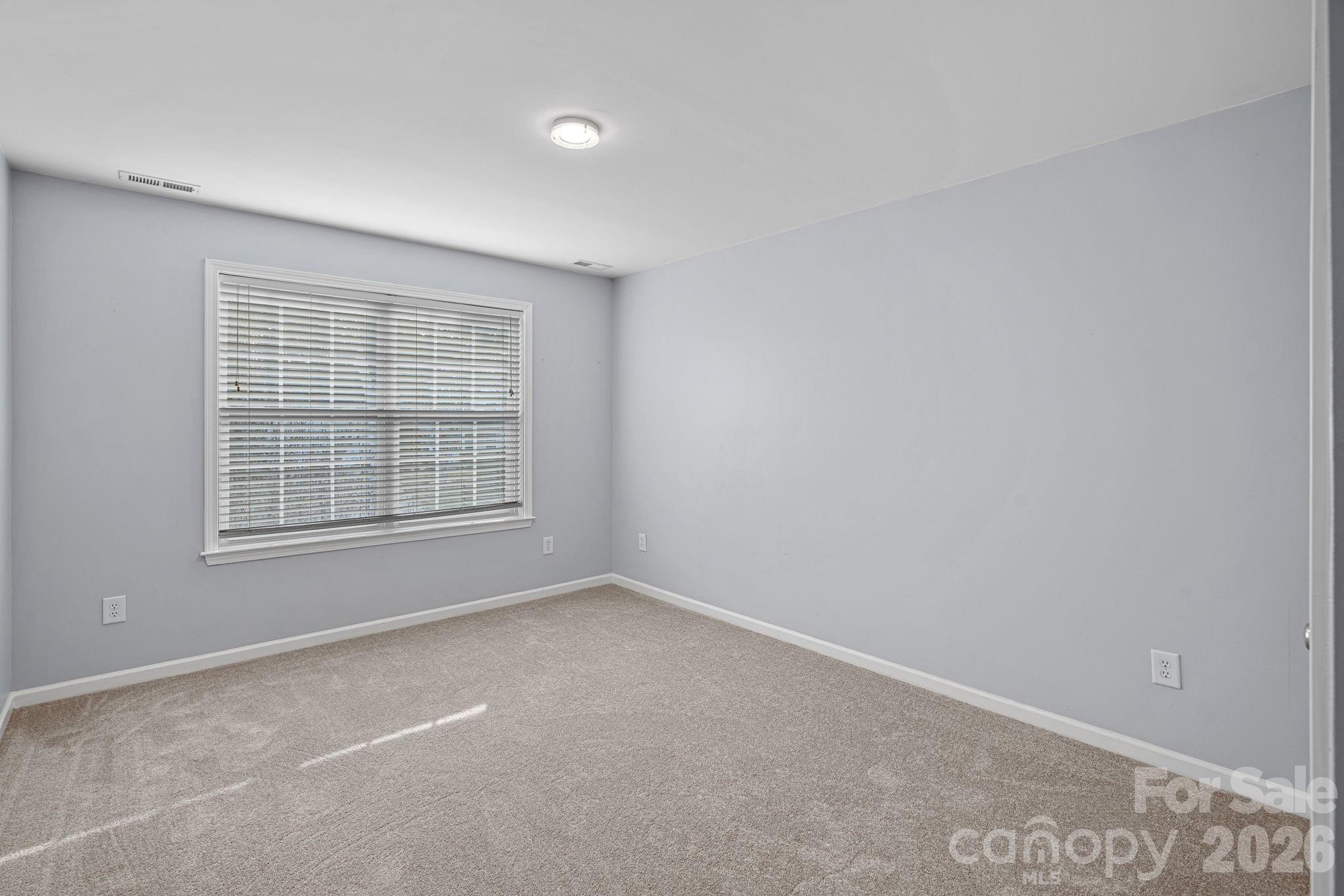 2017 East Foxwood Court Fort Mill, SC 29707 - Photo 21 of 33 an empty room with a window