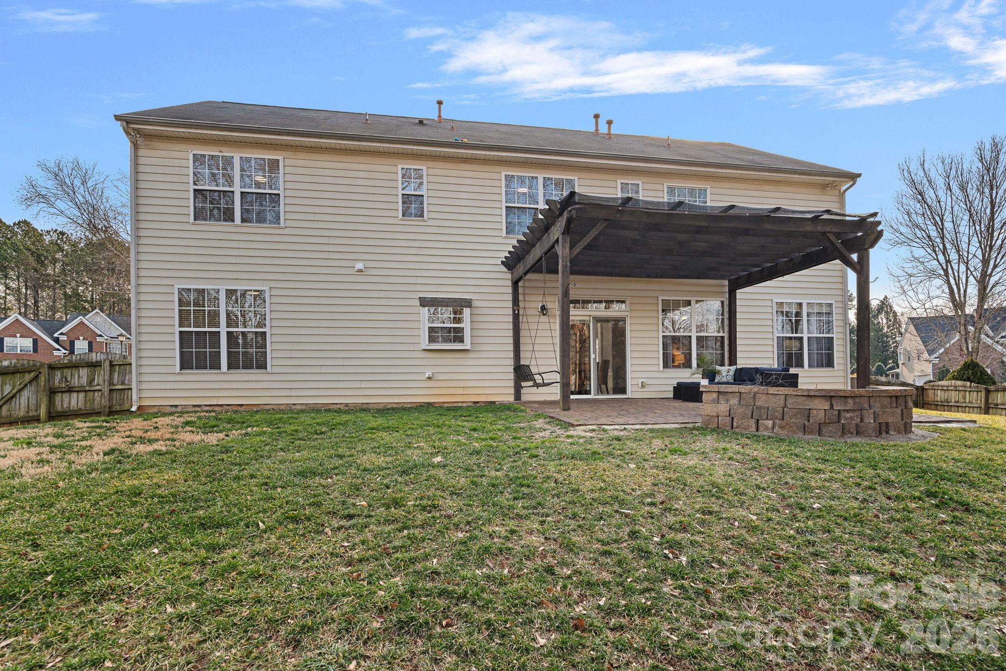 2017 East Foxwood Court Fort Mill, SC 29707 - Photo 30 of 33 a view of a house with a backyard