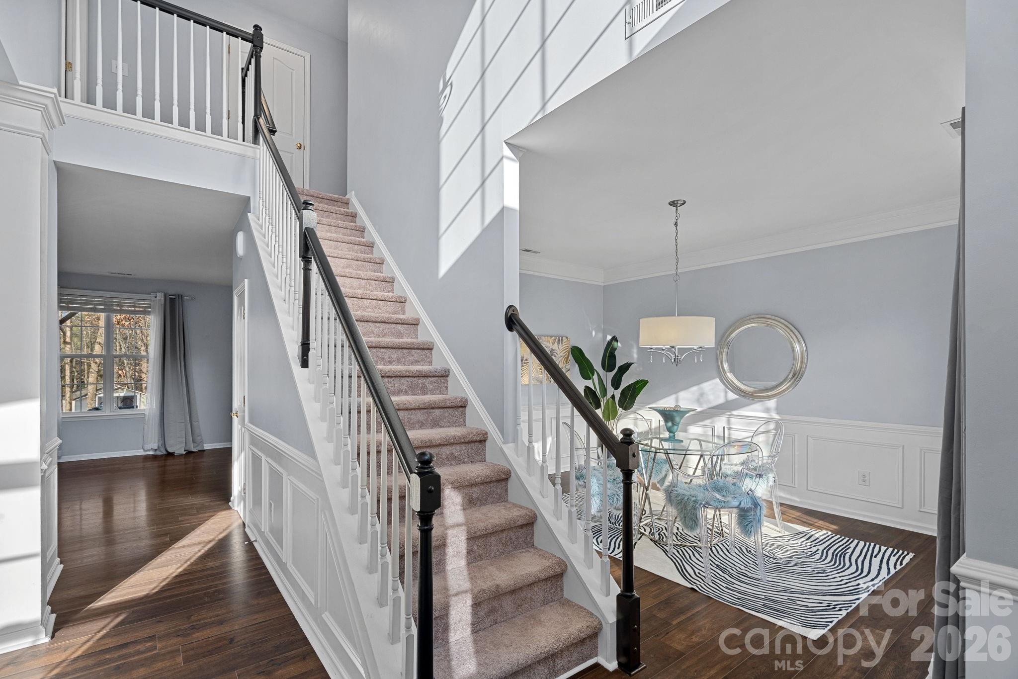 2017 East Foxwood Court Fort Mill, SC 29707 - Photo 3 of 33 a view of entryway and hall with wooden floor