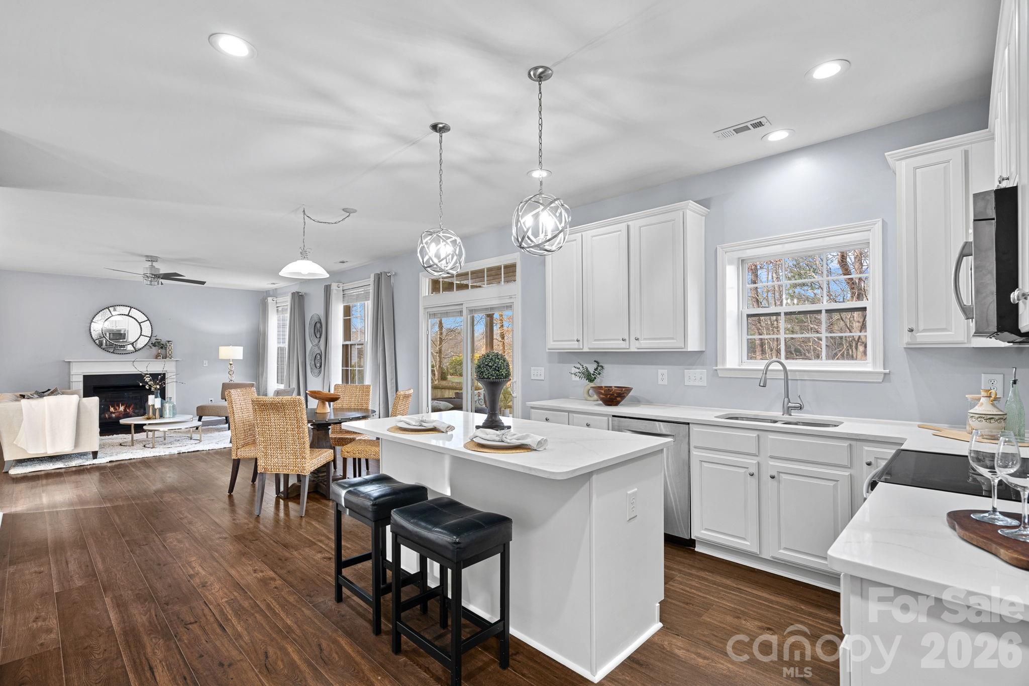 2017 East Foxwood Court Fort Mill, SC 29707 - Photo 10 of 33 a large kitchen with a table and chairs