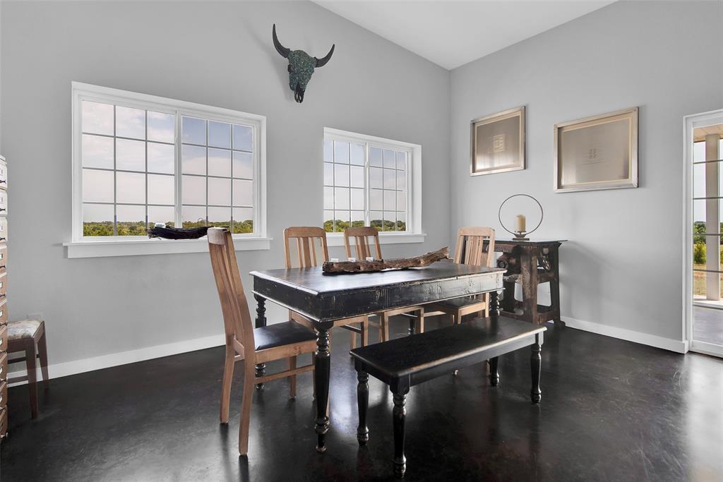 10616 Highway 78 Blue Ridge, TX 75424 - Photo 15 of 28 a view of a dining room with furniture and wooden floor