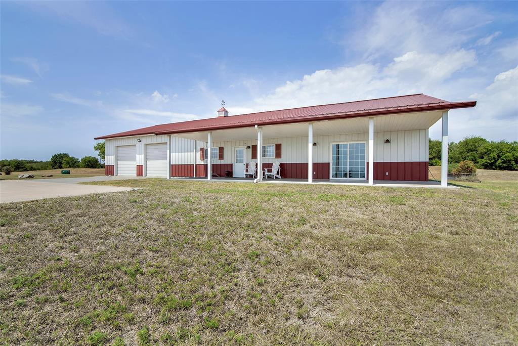 10616 Highway 78 Blue Ridge, TX 75424 - Photo 2 of 28 front view of a house with a yard