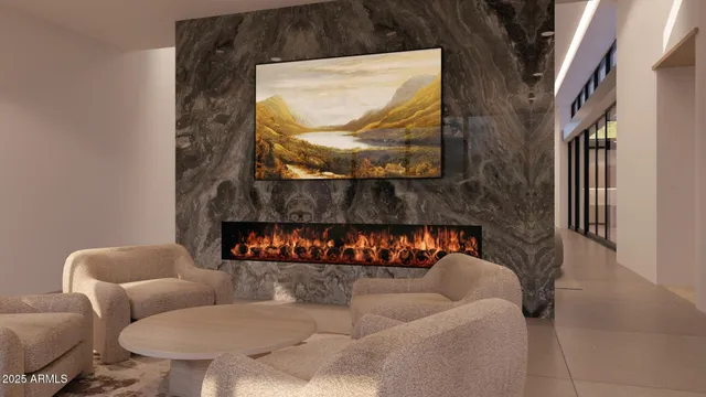 a living room filled with furniture and a potted plant