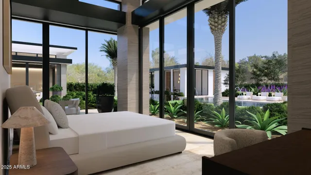 a living room with furniture a fireplace and a potted plant