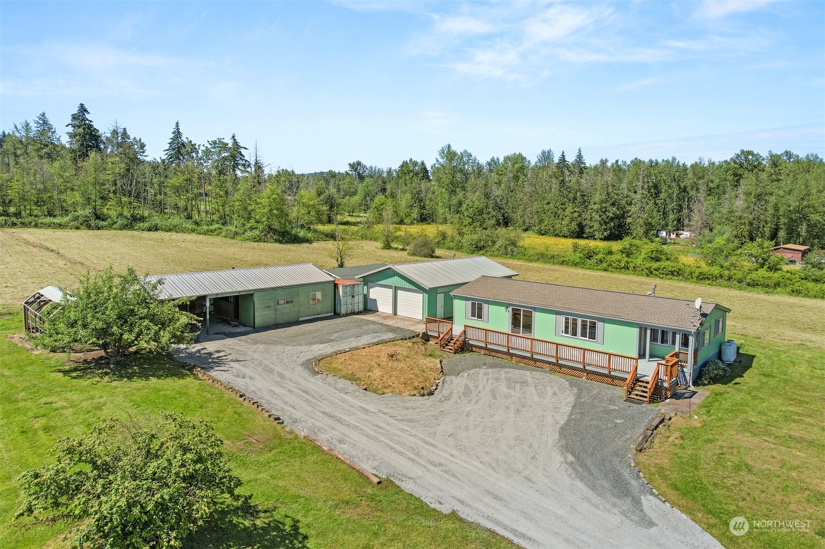 3323 East Smith Road Bellingham, WA 98226 - Photo 1 of 34 a view of a swimming pool with a patio
