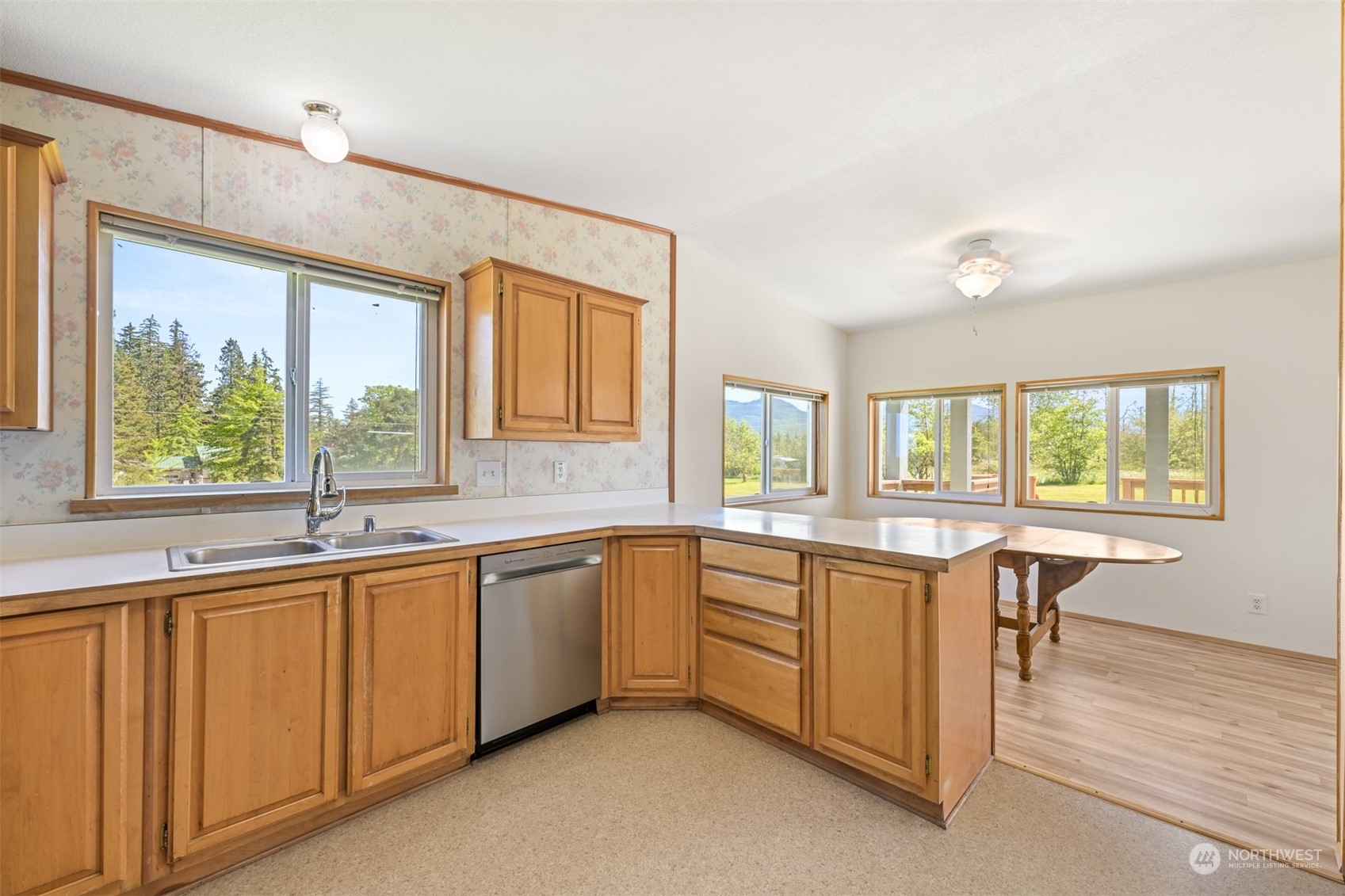 3323 East Smith Road Bellingham, WA 98226 - Photo 12 of 34 a large kitchen with a sink and cabinets