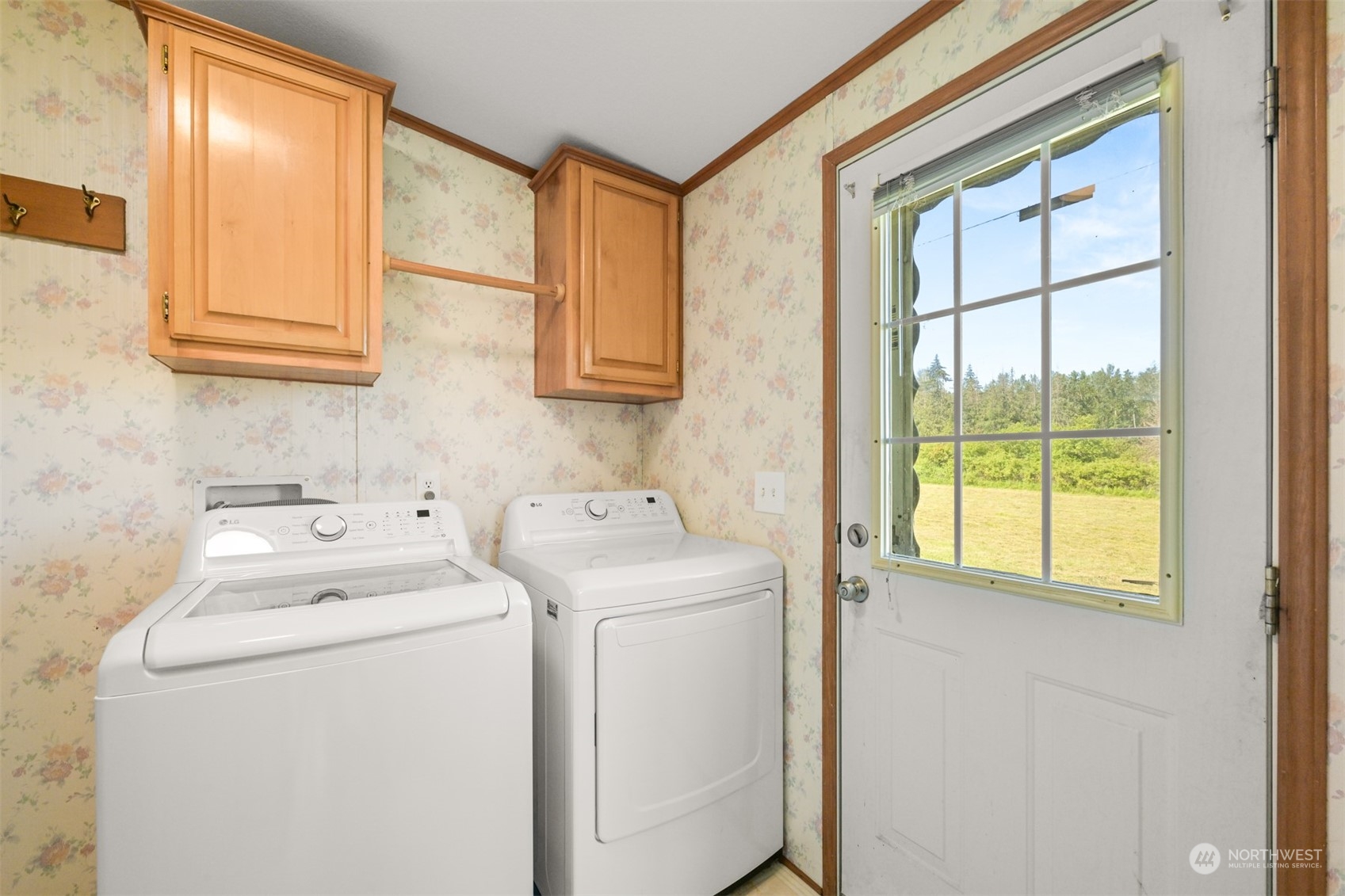 3323 East Smith Road Bellingham, WA 98226 - Photo 20 of 34 a view of storage and utility room with washer and dryer