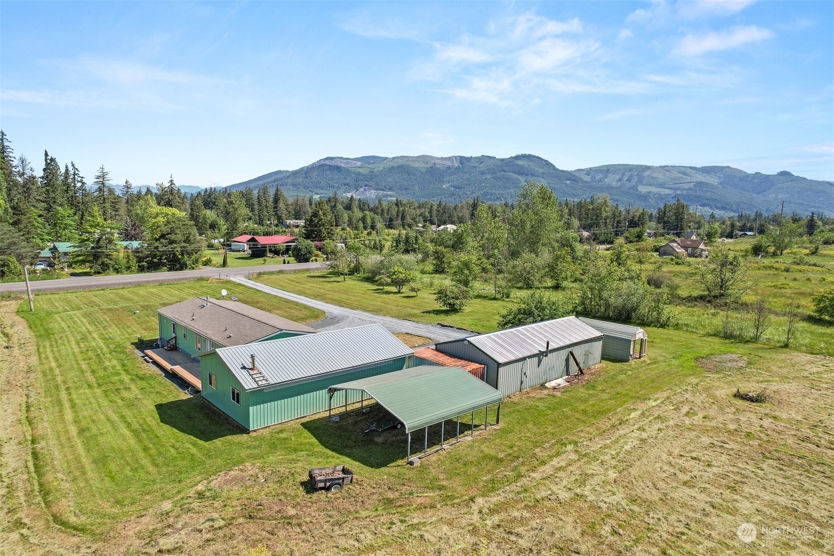 3323 East Smith Road Bellingham, WA 98226 - Photo 31 of 34 a view of a terrace with a yard