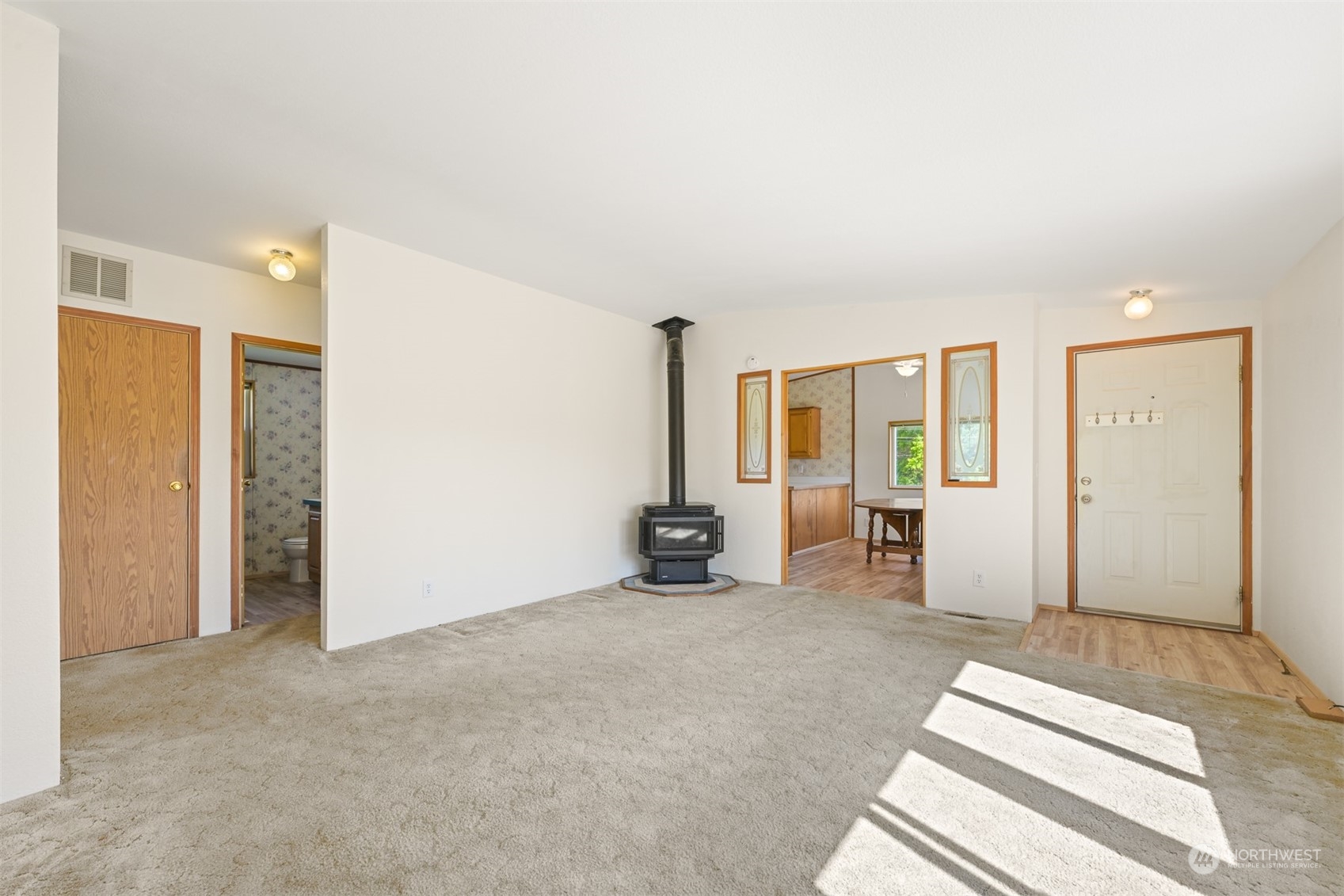 3323 East Smith Road Bellingham, WA 98226 - Photo 5 of 34 a view of a livingroom with a furniture and floor to ceiling window