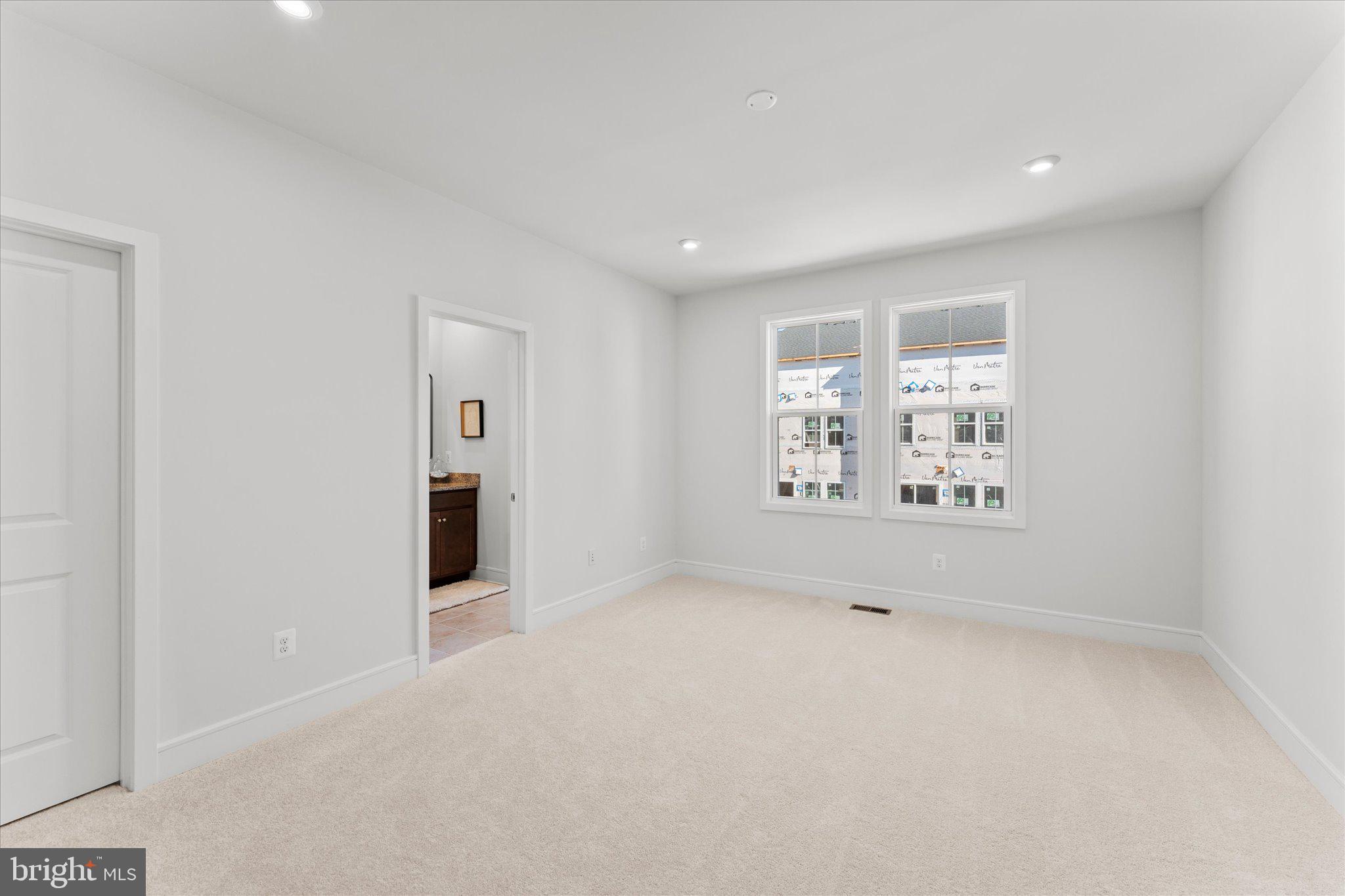 23080 Soaring Hts Terrace Ashburn, VA 20148 - Photo 25 of 44 an empty room with windows