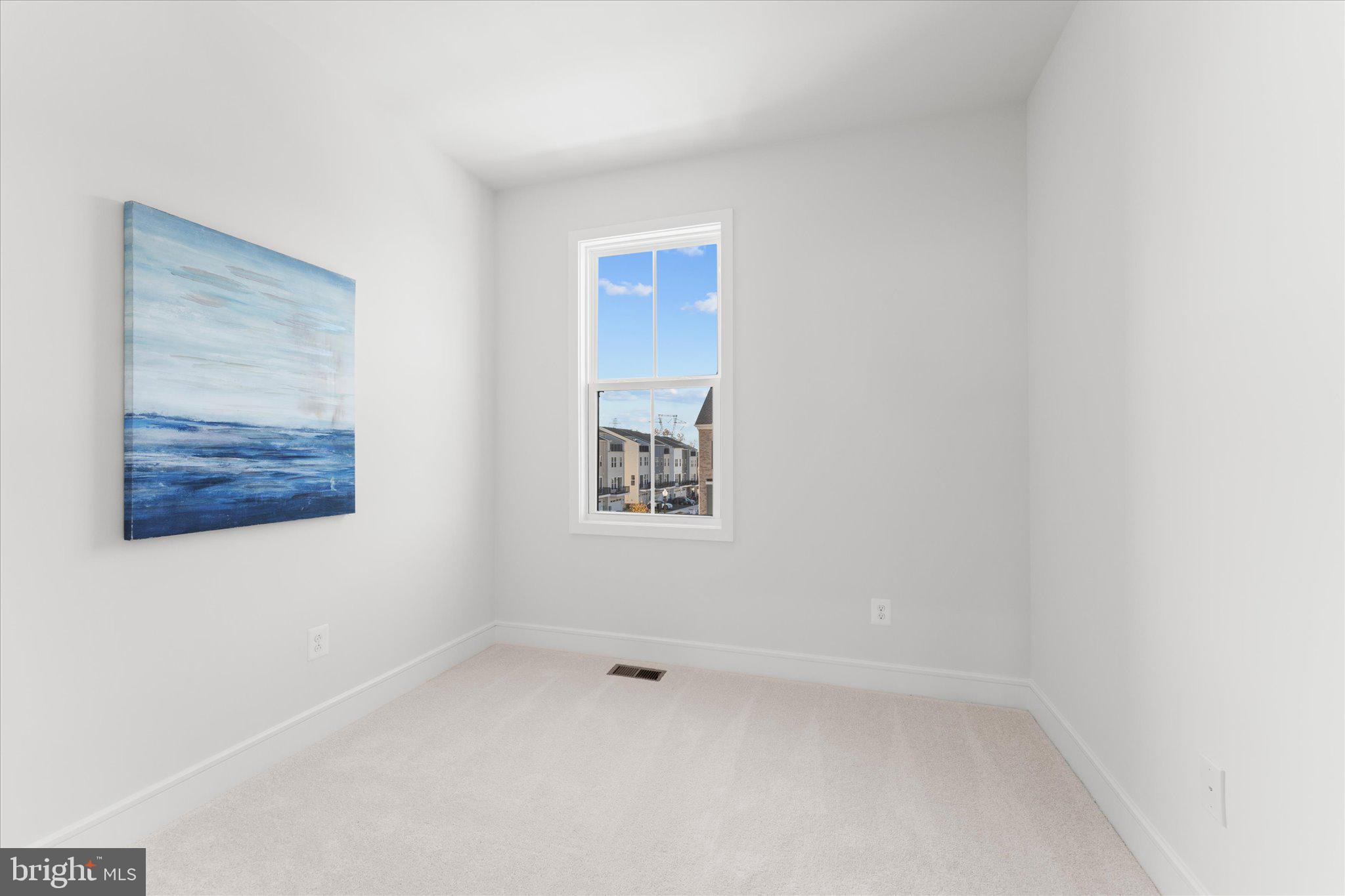 23080 Soaring Hts Terrace Ashburn, VA 20148 - Photo 31 of 44 a view of an empty room with a window