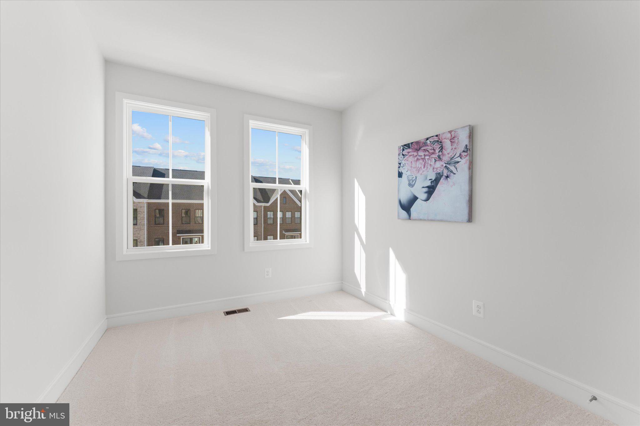 23080 Soaring Hts Terrace Ashburn, VA 20148 - Photo 34 of 44 a view of an empty room with a window