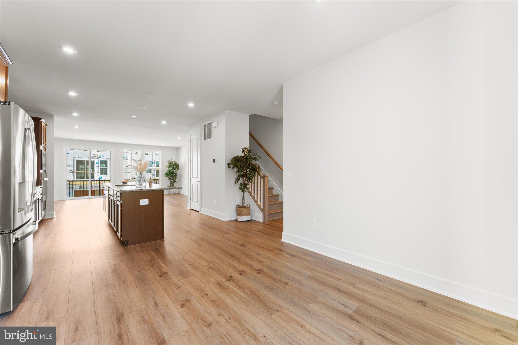 23080 Soaring Hts Terrace Ashburn, VA 20148 - Photo 44 of 44 a view of kitchen with furniture and wooden floor