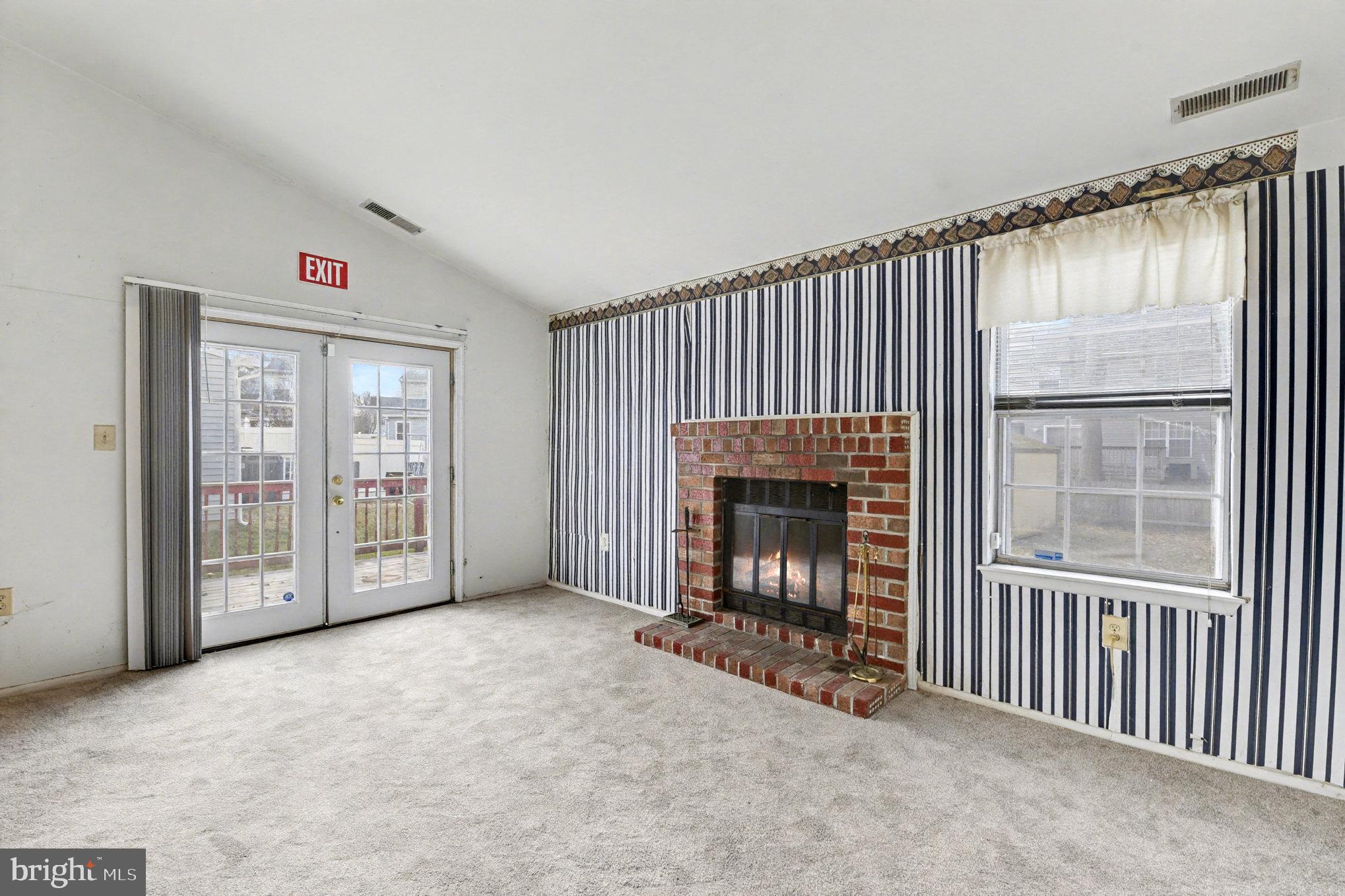 308 Laburnum Road Edgewood, MD 21040 - Photo 13 of 28 a view of an empty room with furniture and a fireplace