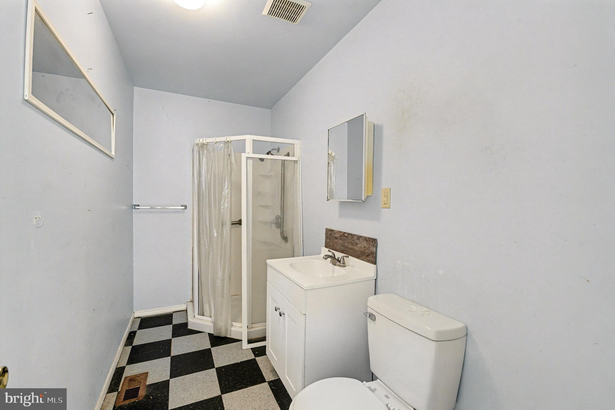 308 Laburnum Road Edgewood, MD 21040 - Photo 19 of 28 a bathroom with a sink toilet and shower
