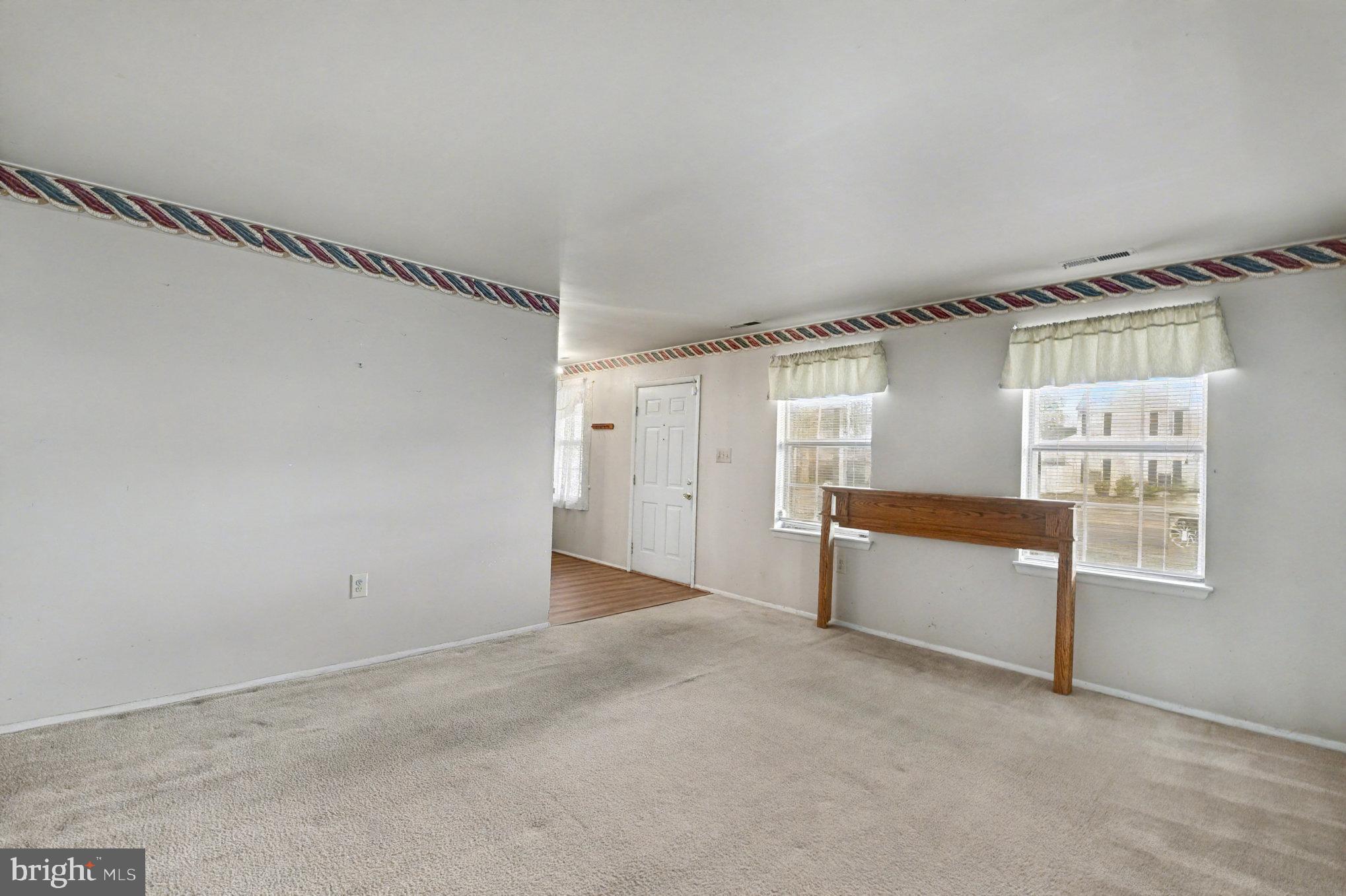 308 Laburnum Road Edgewood, MD 21040 - Photo 5 of 28 a view of an empty room with a window