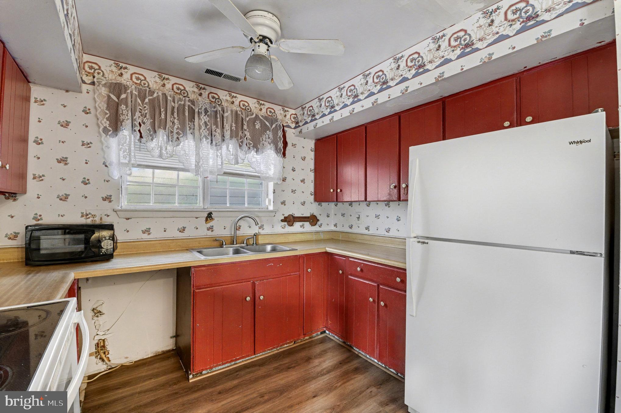 308 Laburnum Road Edgewood, MD 21040 - Photo 10 of 28 a kitchen with stainless steel appliances a sink and cabinets