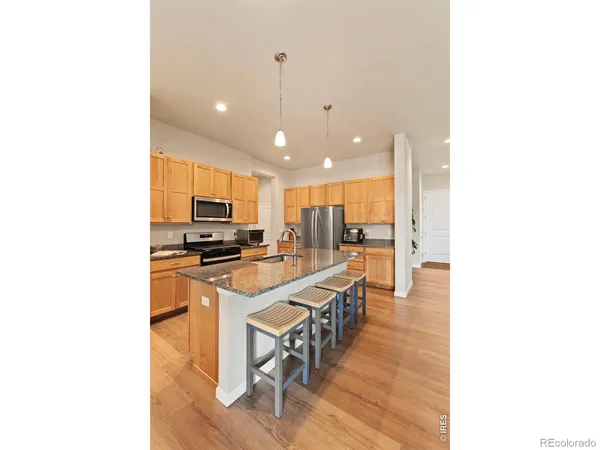 a kitchen with counter space and appliances