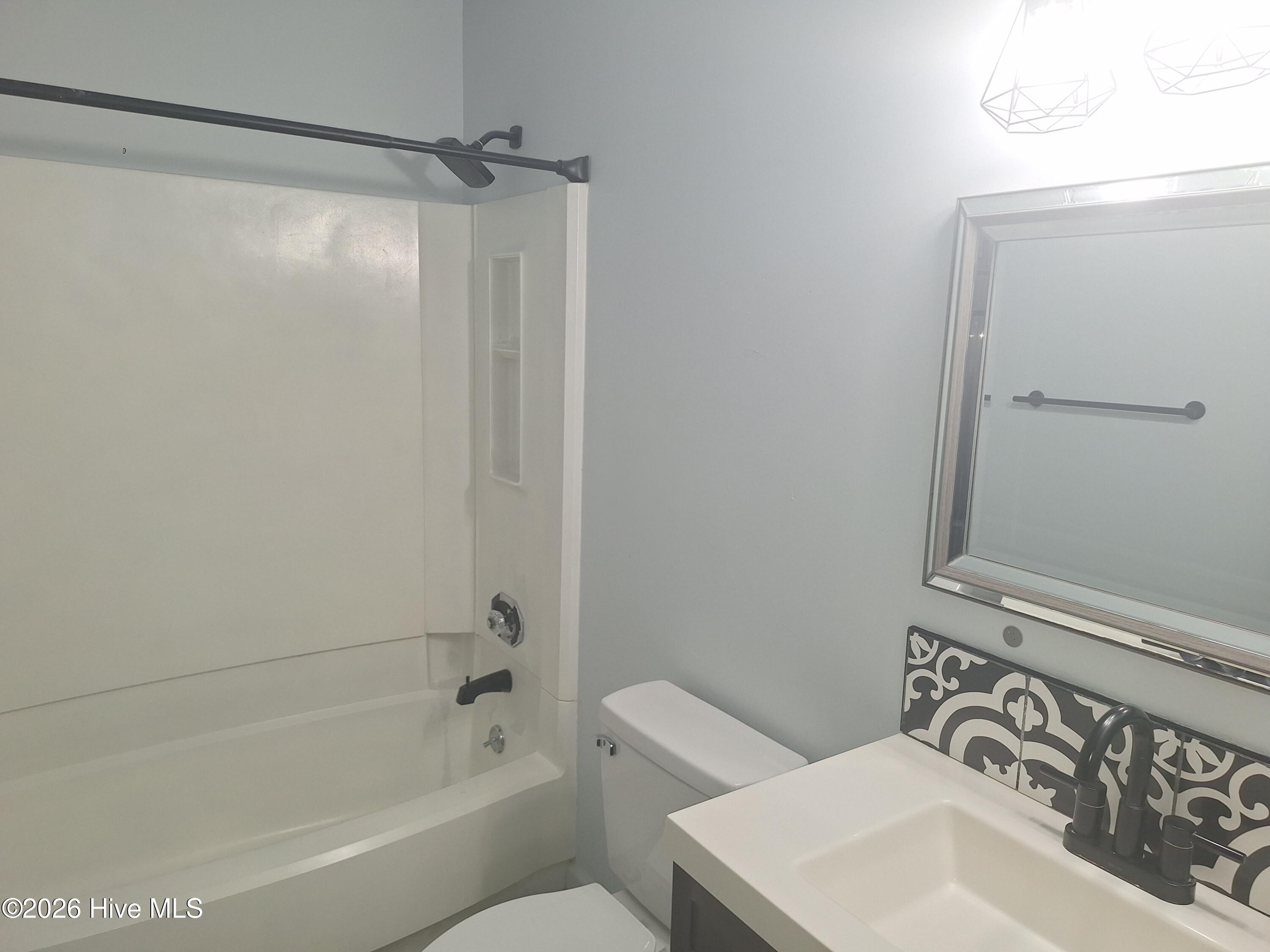 3512 Ivy Commons Drive, Unit 302 Raleigh, NC 27606 - Photo 4 of 12 ic bathroom