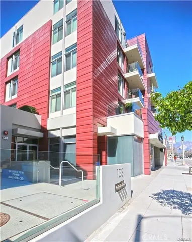 a view of a building with a street