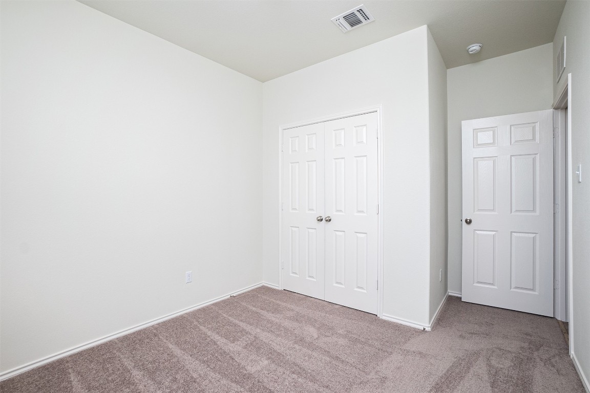 237 Yellowbark Street Buda, TX 78610 - Photo 11 of 28 a view of an empty room
