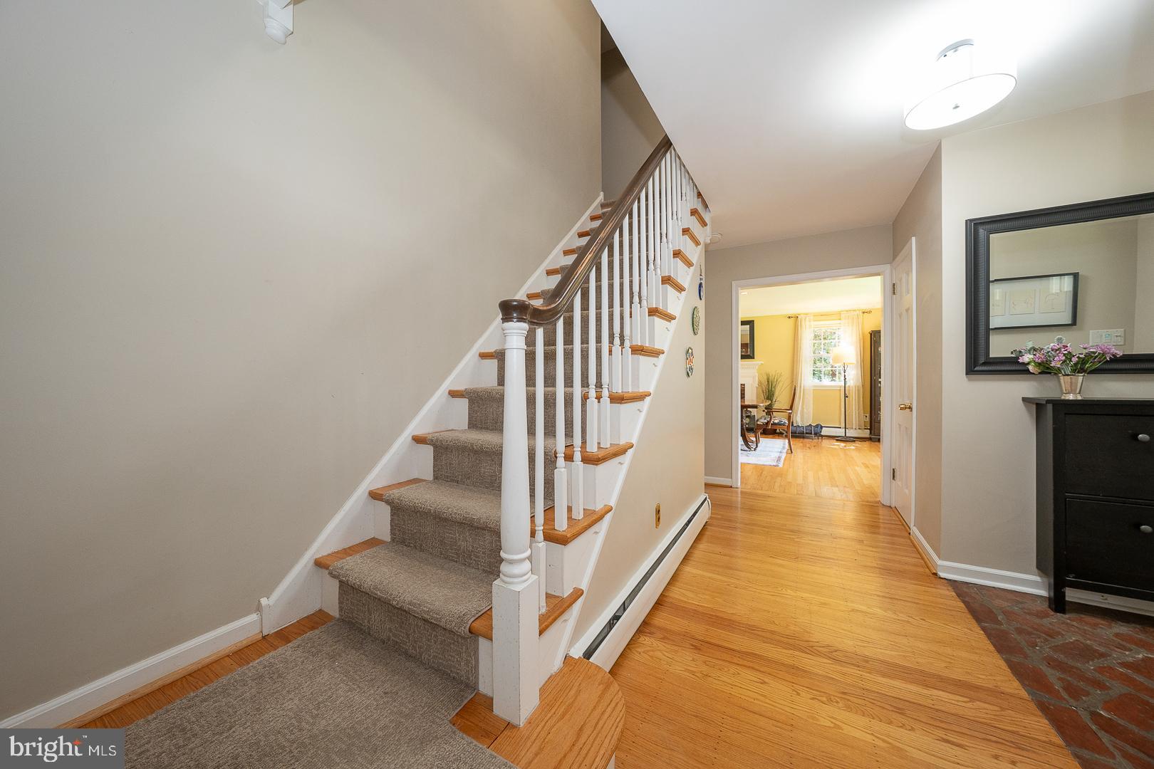 421 Wister Road Wynnewood, PA 19096 - Photo 24 of 53 a view of a hallway with wooden floor and staircase