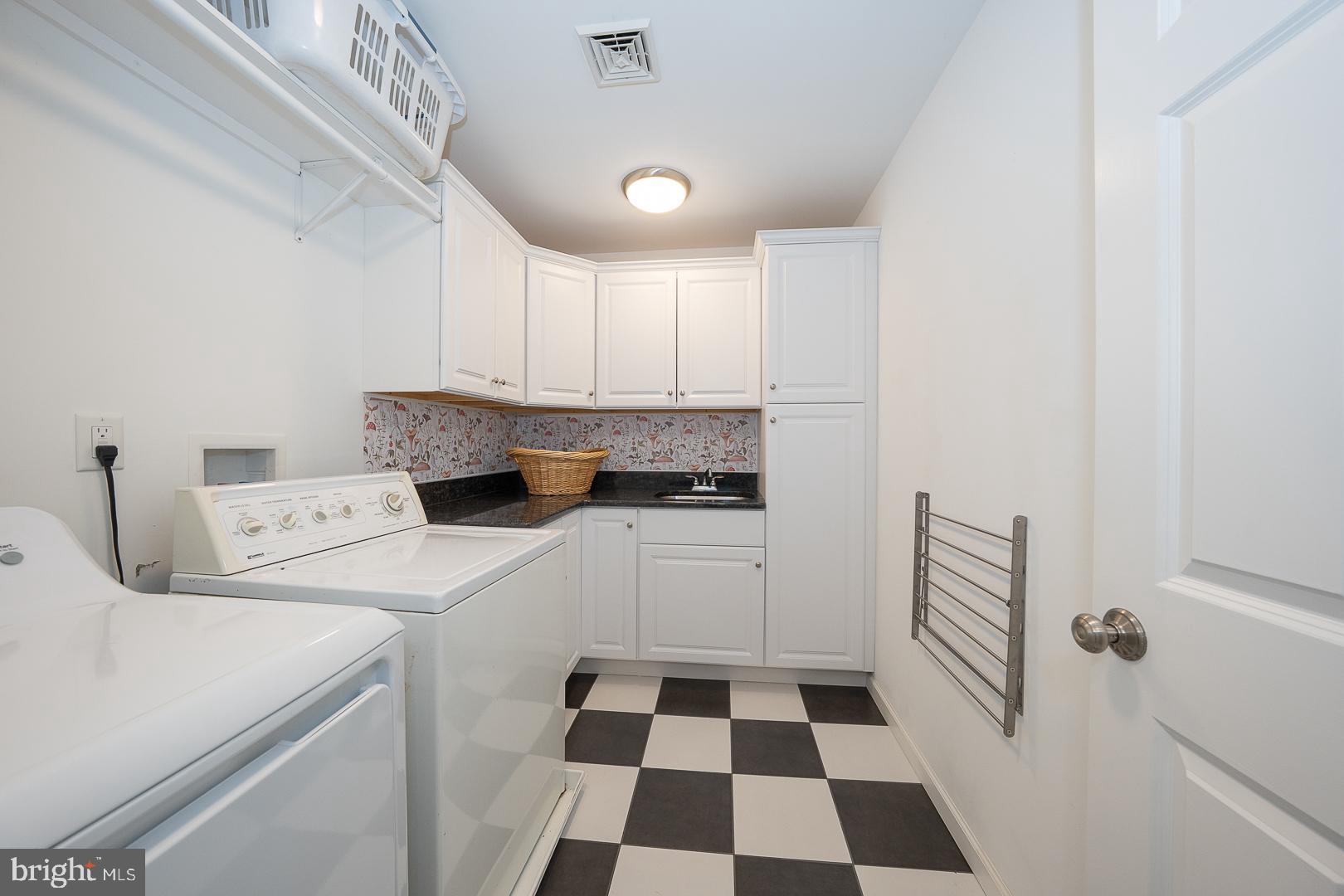 421 Wister Road Wynnewood, PA 19096 - Photo 31 of 53 a kitchen with a sink and a stove top oven