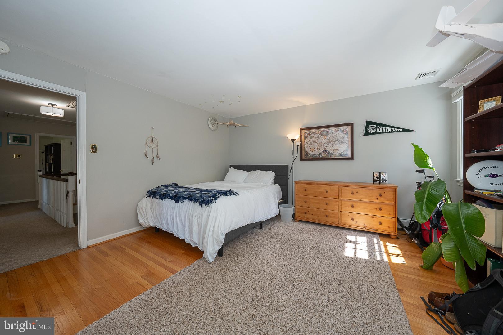 421 Wister Road Wynnewood, PA 19096 - Photo 33 of 53 a bedroom with furniture and a flat screen tv