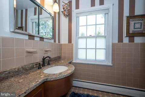 a bathroom with a shower and bathtub