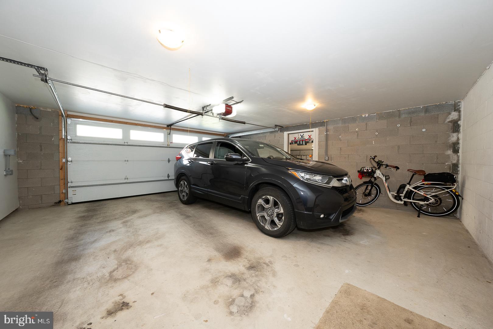 421 Wister Road Wynnewood, PA 19096 - Photo 41 of 53 a view of a garage and car parked