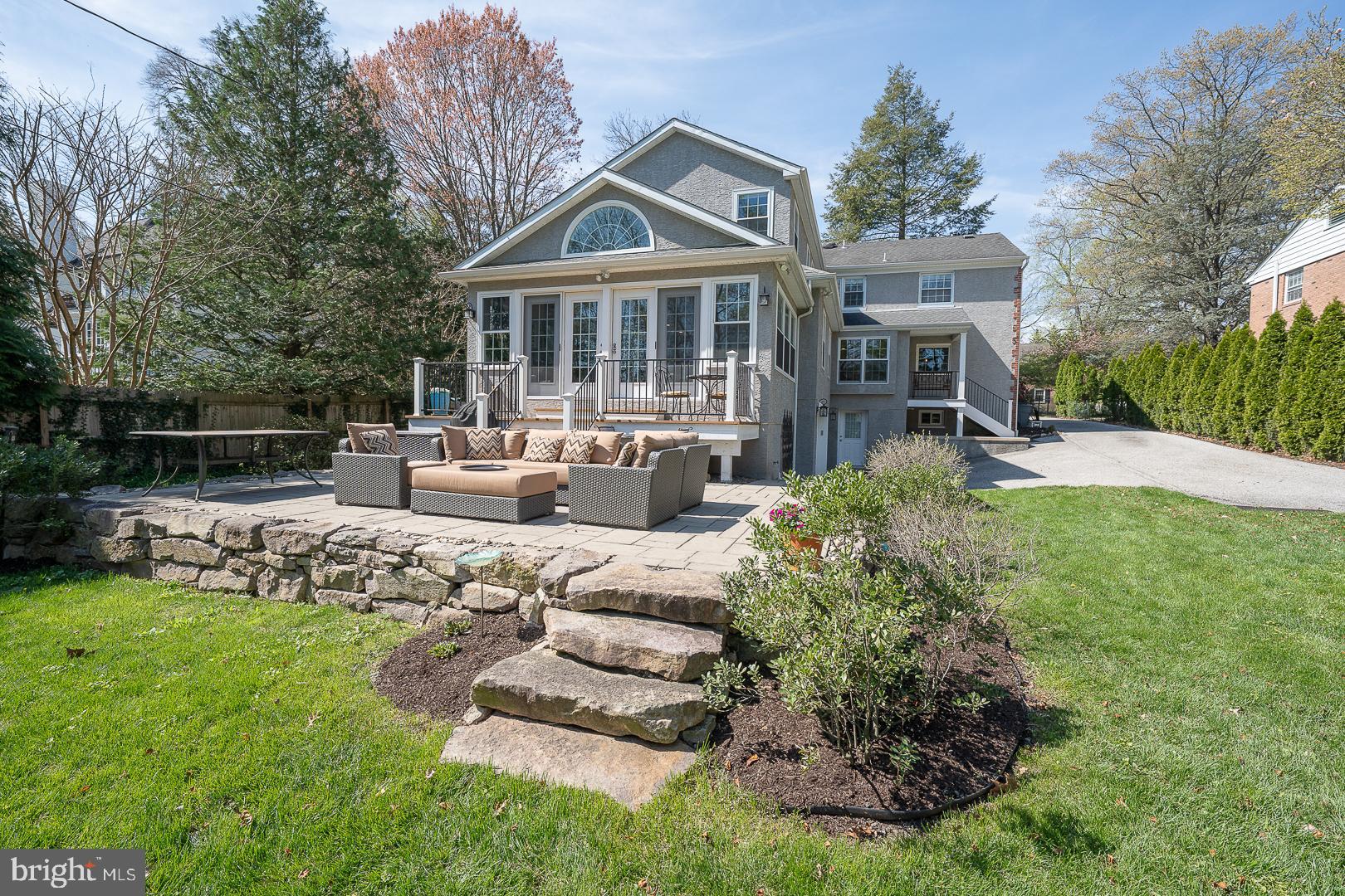 421 Wister Road Wynnewood, PA 19096 - Photo 46 of 53 a front view of a house with a yard table and chairs