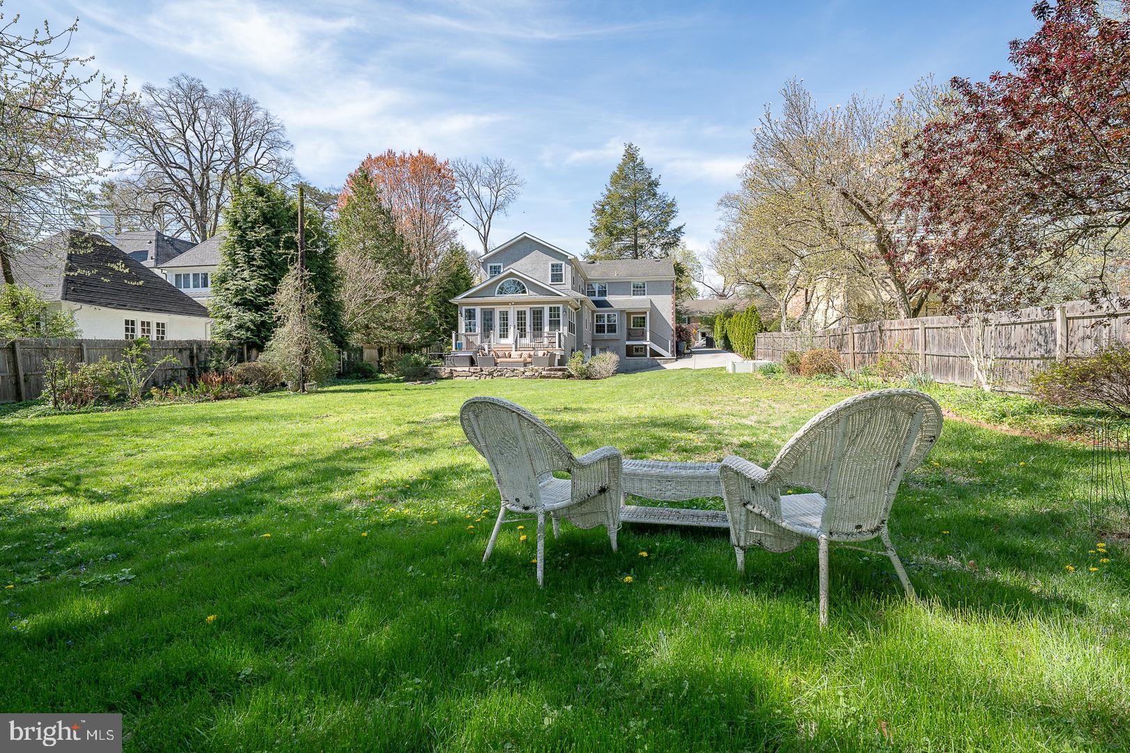 421 Wister Road Wynnewood, PA 19096 - Photo 47 of 53 a view of a house with a yard chairs and table in the garden